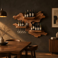 Organic wine rack with a gnarled outline, three shelves and a glass rail in a dark dining room at golden hour