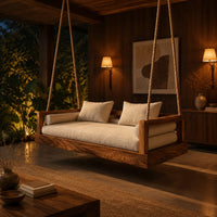 Hanging daybed swing with a thick wood base and low frame sides in an evening porch with walnut wall paneling