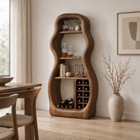 Freeform hourglass cabinet with open shelves and a grid of square cubbies in a Scandinavian dining room with white walls