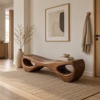 Hourglass bench with a narrow middle and hollow oval ends in a Scandinavian entryway with white walls