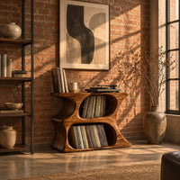 Hourglass record player stand with two stacked oval openings and a flat top in an industrial loft living room with exposed brick