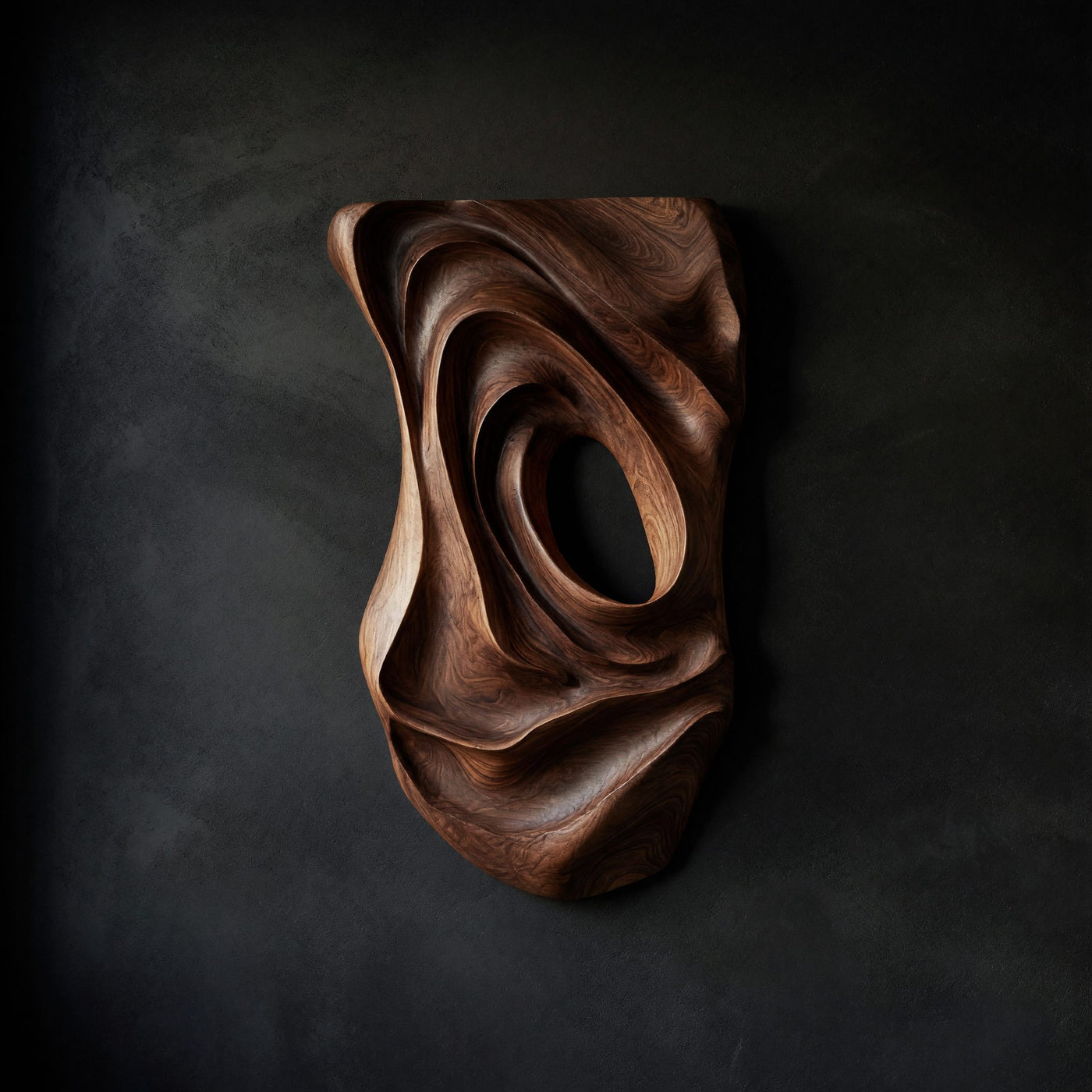 Nested Ovals in a Carved Walnut Wall Sculpture