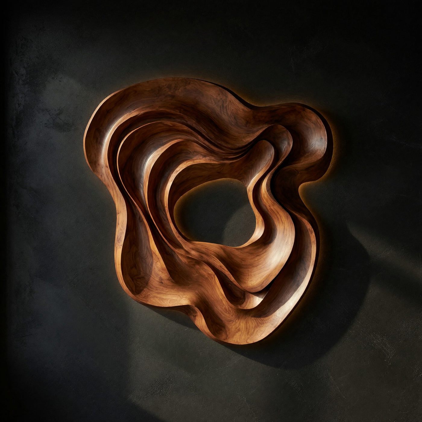 Inward Current, a Carved Walnut Wall Sculpture