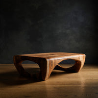 Oval Cutout Coffee Table Carved from One Wood Volume