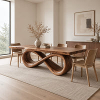 Rectangular dining table with a live edge top on a looped infinity base in a Scandinavian dining room with white walls