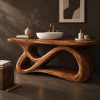 Corner detail of bathroom vanity with a looping figure eight base and open shelf beside wood, brass and linen samples