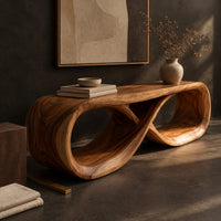 Corner detail of low bench with a flat top and a hollow figure eight loop base beside wood, brass and linen samples