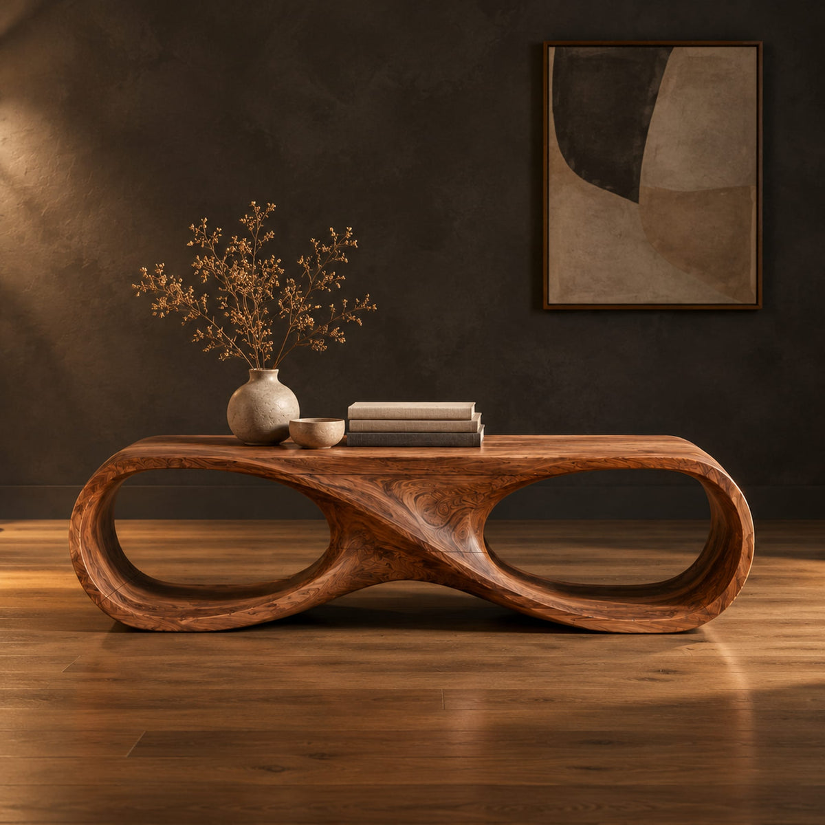 Coffee table shaped as an infinity loop with two oval openings in a dark studio against a charcoal plaster wall