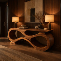 Console table shaped as an infinity loop with open ribbon spaces in an evening entryway with walnut wall paneling