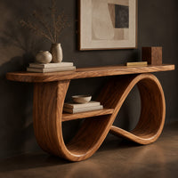 Corner detail of console table with a figure eight ribbon base and a middle shelf beside wood, brass and linen samples