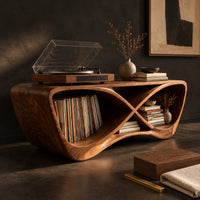 Corner detail of infinity shaped record console with open bays and a smooth sculpted body beside wood, brass and linen samples