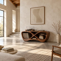 Infinity shaped record console with open bays and a smooth sculpted body in a bright open plan living room