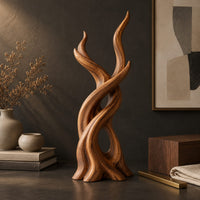 Corner detail of interlaced branch sculpture with flame shaped tips and an open hollow near the base beside wood, brass and linen samples
