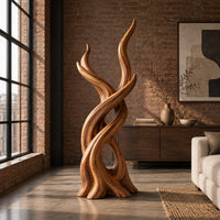 Interlaced branch sculpture with flame shaped tips and an open hollow near the base in an industrial loft living room with exposed brick