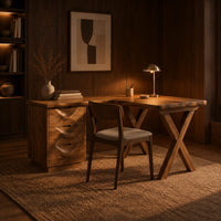 L shaped desk with a three drawer pedestal and crossed x legs in an evening home office with walnut wall paneling