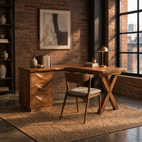 L shaped desk with a three drawer pedestal and crossed x legs in an industrial loft home office with exposed brick