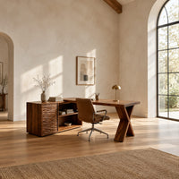 L shaped wood desk with ripple carved side unit and x shaped leg in a bright open plan home office