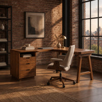 L shaped desk with a three drawer pedestal, open cubby and trestle leg in an industrial loft home office with exposed brick