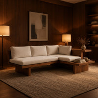 L shaped sofa with cream cushions on a low wood platform base in an evening living room with walnut wall paneling