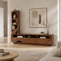 Tv stand with a tall arched shelf tower and flowing carved lines in a Scandinavian living room with white walls