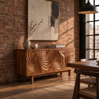 Sideboard with four layered swirl carved panels on sturdy legs in an industrial loft dining room with exposed brick