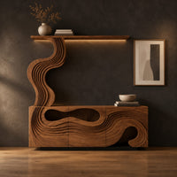 Tv stand with wave carved panels and a rising column holding a shelf in a dark studio against a charcoal plaster wall