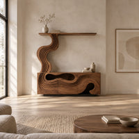 Tv stand with wave carved panels and a rising column holding a shelf in a bright open plan living room