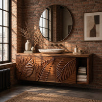 Leaf carved bathroom vanity cabinet with three panels and an open cubby in an industrial loft bathroom with exposed brick