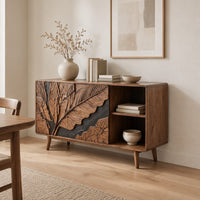 Low sideboard with carved leaf panels, an open shelf section and tapered legs in a Scandinavian dining room with white walls