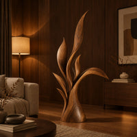 Wood sculpture of layered leaf blades rising from one tapered base in an evening living room with walnut wall paneling