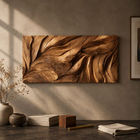 Detail of wide wall art panel carved with flowing leaf veins in deep relief beside wood, brass and linen samples