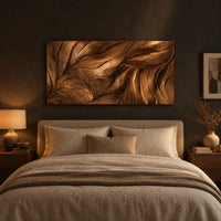 Wide wall art panel carved with flowing leaf veins in deep relief above a bed in a dusk lit bedroom