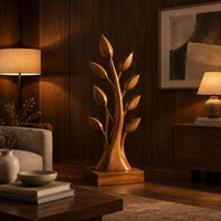 Tree shaped wood sculpture with leaf tips and a flared trunk in an evening living room with walnut wall paneling