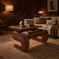 Lift top coffee table with scroll shaped legs and a bay below the top in an evening living room with walnut wall paneling