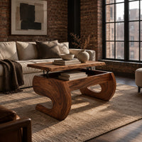 Lift top coffee table with scroll shaped legs and a bay below the top in an industrial loft living room with exposed brick