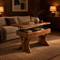 Lift top coffee table with a natural edge top and two trunk shaped legs in an evening living room with walnut wall paneling
