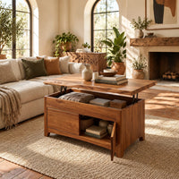 Wood coffee table with a lifting live edge top and an open side shelf in a bright living room with arched windows and plants