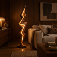 Lightning bolt floor lamp with angular faceted sides and a glowing seam in an evening living room with walnut wall paneling