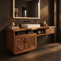 Live edge bathroom vanity cabinet with carved wave doors and a small drawer, three-quarter view showing the grain