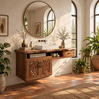 Live edge bathroom vanity cabinet with carved wave doors and a small drawer in a bright bathroom with arched windows and plants