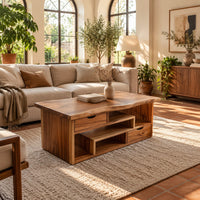 Live edge coffee table with staggered open shelves and two small drawers in a bright living room with arched windows and plants