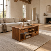 Live edge coffee table with staggered open shelves and two small drawers in a bright open plan living room