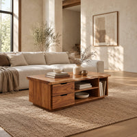 Live edge coffee table with two drawers an open shelf and a side cubby in a bright open plan living room
