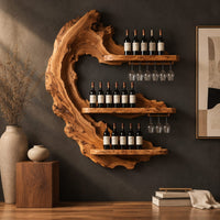 Corner detail of live edge crescent wine rack with three shelves and rails for hanging stemware beside wood, brass and linen samples