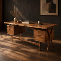 Live edge wooden desk with four drawers and slim tapered legs, three-quarter view showing the grain