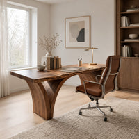 Live edge desk on two arched slab legs that flare toward the top in a Scandinavian home office with white walls