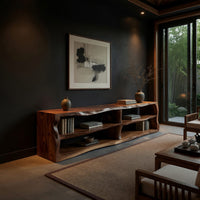 Live edge TV cabinet with open shelves in a living room at golden hour