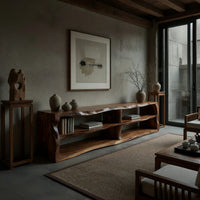 Live edge TV cabinet with open shelves in a concrete and timber loft