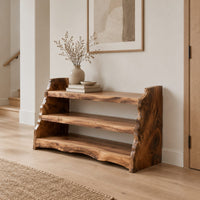 Open shoe shelf with three tiers and natural live edge sides in a Scandinavian entryway with white walls