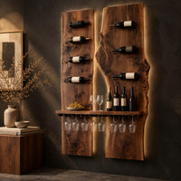 Corner detail of two tall wood slab panels with slim dark pegs and a shelf for glasses beside wood, brass and linen samples